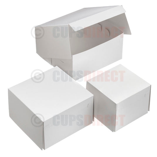 Group image of 5 inch tall white cake and dessert boxes in multiple sizes